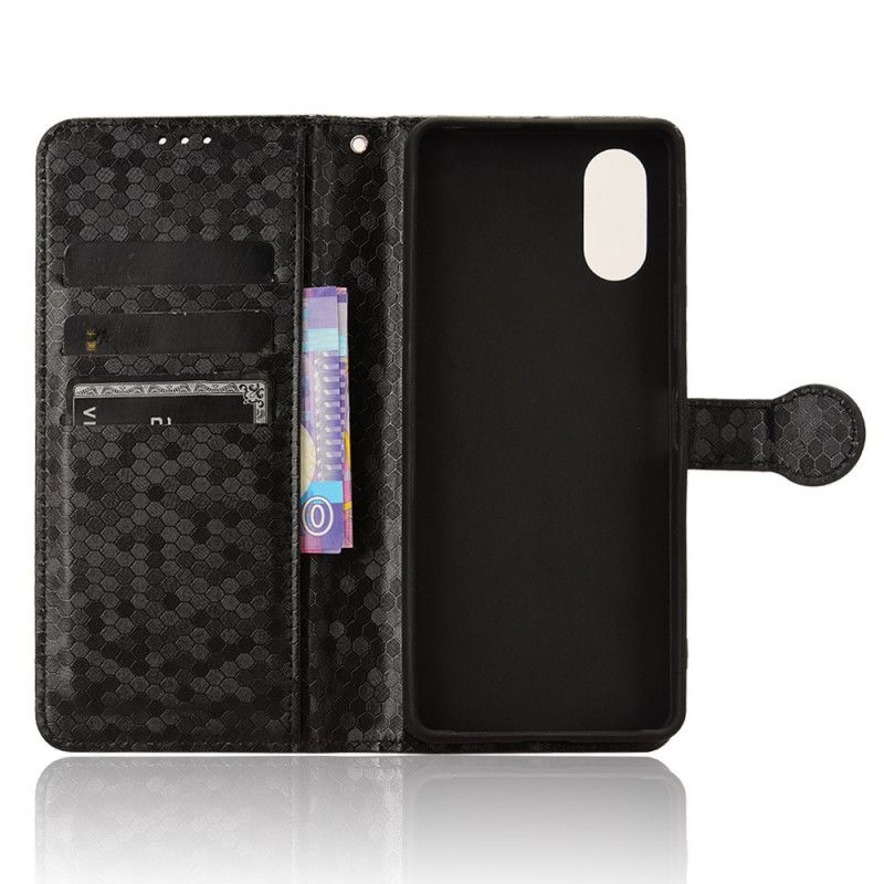 Flip Cover Sony Xperia 10 Vi Skinnende Prikker Med Rem