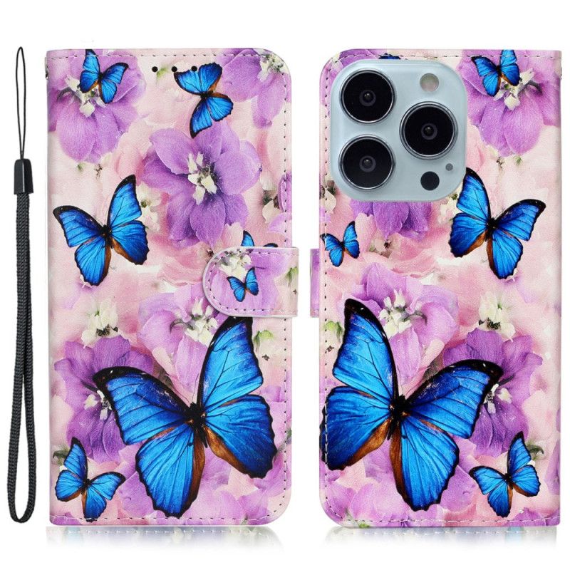 Flip Cover iPhone 16 Pro Max Sommerfugle Og Lilla Blomster Med Rem