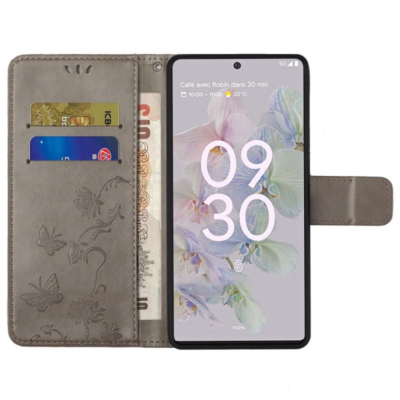 Flip Cover Google Pixel 6A Med Snor Thong Blomster Og Sommerfugle