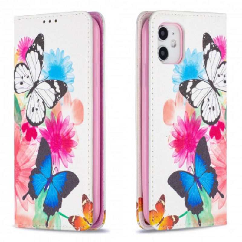 Cover iPhone 11 Flip Cover Farverige Sommerfugle