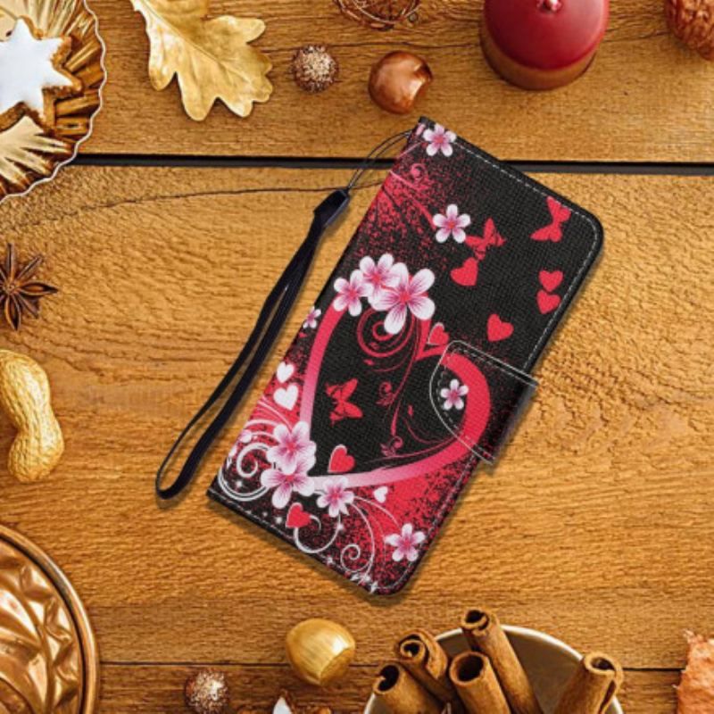 Læder Cover Samsung Galaxy M12 / A12 Blomster Og Hjerter Med Snor